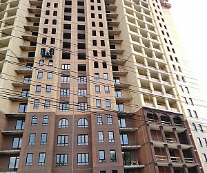 Фасад многоквартирного дома облицовочный кирпич Строма